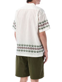 Camisetas de Manastash y polos blancos