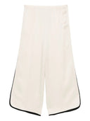 Pantalon court brillant fort vers le satin