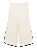 Pantalon court brillant fort vers le satin