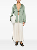 Pantalon court brillant fort vers le satin