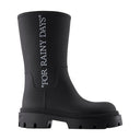 Zapatillas Reboot Rainy Days Off White Cuero Negro