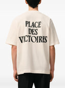 Ami Paris Boxy Fit Kurzarm-Adc-T-Shirt mit charakteristischem Aufdruck auf der Rückseite