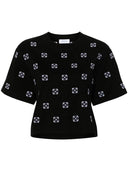 Uit wit t -shirt met pijlen borduurwerk
