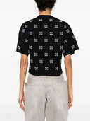 Uit wit t -shirt met pijlen borduurwerk