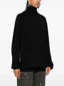 Moschino Sweater With Logo Pendant