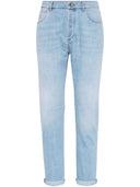 Brunello Cucinelli taps toelopende jeans met een gemiddelde stijging