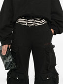 I pantaloni sportivi del gradiente Attico