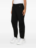 Dolce & Gabbana Tapered Trousers With Logo Plaque
