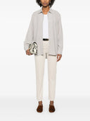 Toteme taps toelopende jeans