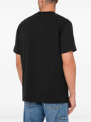 Camiseta de moschino con estampado de osito de peluche