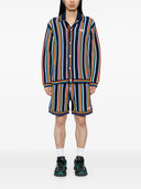 Casablanca shorts met logo -kenmerken marineblauw Drawstring Sluiting Front Toepassing met logo rechte zoom Samenstelling Katoen 96%, Polyamide 3%, Elastaan ​​1%Wasinstructies Handwasmerk ID: MPS25 KW83701