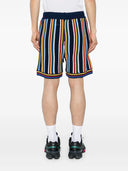 Casablanca shorts met logo -kenmerken marineblauw Drawstring Sluiting Front Toepassing met logo rechte zoom Samenstelling Katoen 96%, Polyamide 3%, Elastaan ​​1%Wasinstructies Handwasmerk ID: MPS25 KW83701