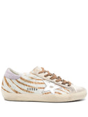 Sneaker superstar d'oro