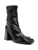 أحذية Courreges مع شعار زين