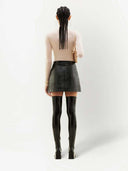 Courreges اندلعت تنورة صغيرة