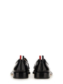 Mobine de cuir Thom Browne