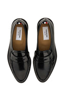 Mobine de cuir Thom Browne