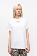 Camisetas de Ganni y polos blancos