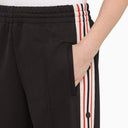 Pantaloni sportivi blu scuro d'oca con banda laterale