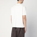 La nostra maglietta bianca eredità nel sole di strabico di cotone