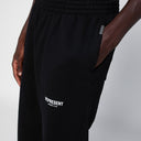 Representar pantalones de jogging de algodón negro
