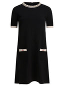 Vestido estilo gargantilla con adornos de Valentino