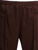 Pantalón deportivo Needles "Boot Cut Poly Smooth"
