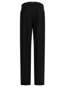 Pantalones "rotos" de Tom Ford