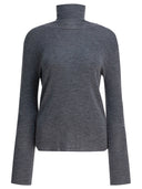 Jersey de cuello alto de lana Umarmung