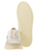 Autry -medalist med lavt læder og ruskind sneakers