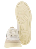 Autry -medalist med lavt læder og ruskind sneakers