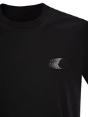 Moncler T -skjorte med falmet logo -motiv i bomull