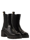 Stuart Weitzman Soho Chelsea Leder -Knöchelstiefel mit Zwischensohle
