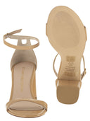 Stuart Weitzman – Glänzende Ledersandalen mit Blockabsatz