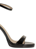 Stuart Weitzman Sandali con plateau in pelle lucida e tacco a spillo