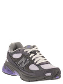 New Balance U2010-Trainer mit seitlichem Logo