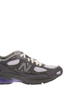 New Balance U2010-Trainer mit seitlichem Logo