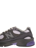 New Balance U2010-Trainer mit seitlichem Logo