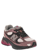 New Balance U2010-Trainer mit seitlichem Logo