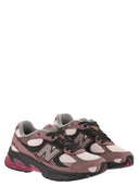New Balance U2010-Trainer mit seitlichem Logo
