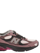 New Balance U2010-Trainer mit seitlichem Logo
