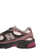 New Balance U2010-Trainer mit seitlichem Logo