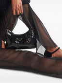 Pantaloni svasati semitrasparenti di Prada