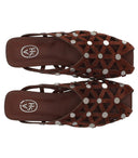 Flache Mules in Burgunderrot mit Ash Bone-Motiv