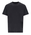 Dagelijkse papieren overbelaste zwart T -shirt