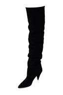 Saint Laurent Era 85 sur les bottes du genou