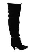 Saint Laurent Era 85 sur les bottes du genou