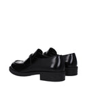 Prada Hombres Mocasines de cuero negros