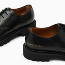 Progetti comuni in pelle nera in pizzo