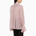 La camicia a pois semi trasparente di andamane rosa trasparente